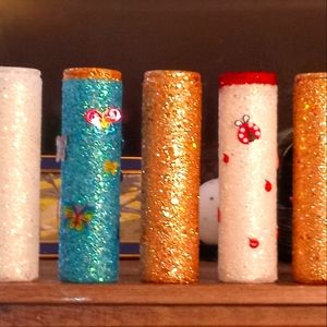 Hand decorated designs made to order.  11" x3" long burning candles. $12.50